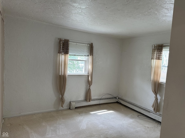 318 Elva St, Anderson, IN 46013 - empty room with a baseboard radiator, carpet, and a textured ceiling