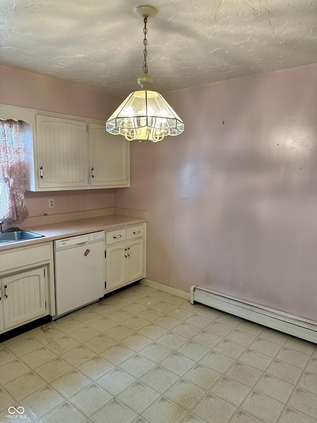 318 Elva St, Anderson, IN 46013 - kitchen featuring white dishwasher, baseboard heating, a sink, light countertops, and baseboards