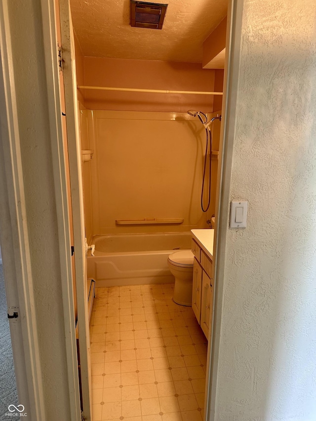 318 Elva St, Anderson, IN 46013 - full bathroom featuring visible vents, shower / washtub combination, tile patterned floors, vanity, and toilet