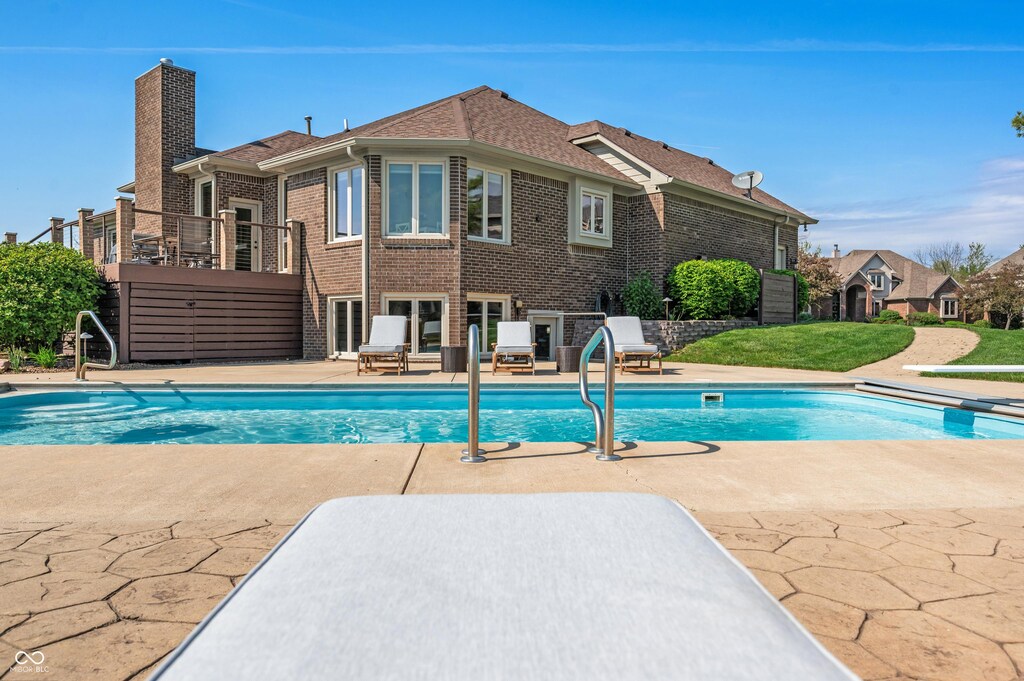 pool with a patio area