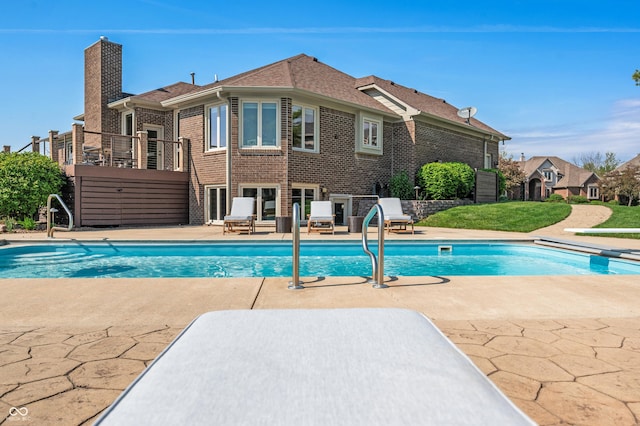 pool with a patio area