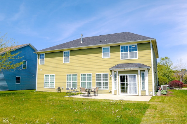 9993 Pepper Tree Ln, Noblesville, IN 46060 - back of property featuring a lawn and a patio area