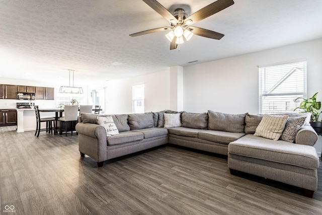 6559 Ambrosia Ln, Pendleton, IN 46064 - living area with ceiling fan, wood finished floors, and a wealth of natural light