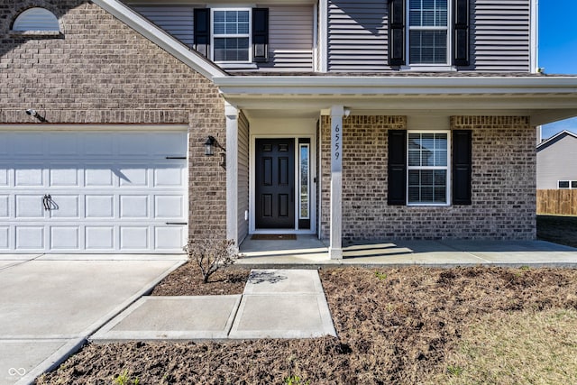 6559 Ambrosia Ln, Pendleton, IN 46064 - entrance to property with a porch, brick siding, and driveway