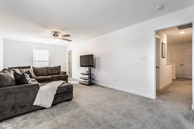 6559 Ambrosia Ln, Pendleton, IN 46064 - living area with baseboards, a ceiling fan, carpet flooring, and visible vents