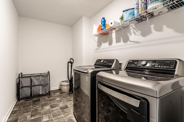 6559 Ambrosia Ln, Pendleton, IN 46064 - laundry area with laundry area, baseboards, separate washer and dryer, and stone finish floor