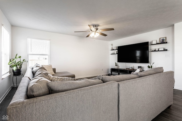 6559 Ambrosia Ln, Pendleton, IN 46064 - living area with baseboards, dark wood-style flooring, and ceiling fan