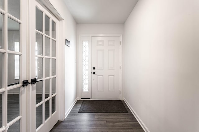 6559 Ambrosia Ln, Pendleton, IN 46064 - entryway featuring dark wood-style flooring, baseboards, and french doors