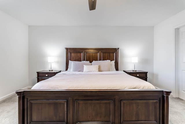 6559 Ambrosia Ln, Pendleton, IN 46064 - bedroom with baseboards, ceiling fan, and light colored carpet