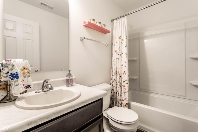 6559 Ambrosia Ln, Pendleton, IN 46064 - bathroom featuring visible vents, shower / bath combo, toilet, and vanity