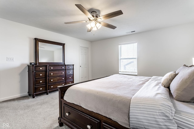 6559 Ambrosia Ln, Pendleton, IN 46064 - bedroom featuring baseboards, ceiling fan, light colored carpet, and visible vents