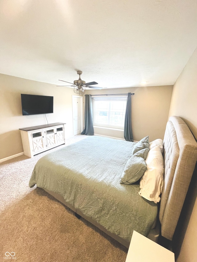 657 Kilmore Dr, Pendleton, IN 46064 - bedroom featuring carpet floors, a ceiling fan, and baseboards