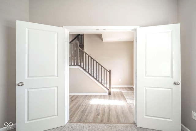 657 Kilmore Dr, Pendleton, IN 46064 - staircase with wood finished floors and baseboards