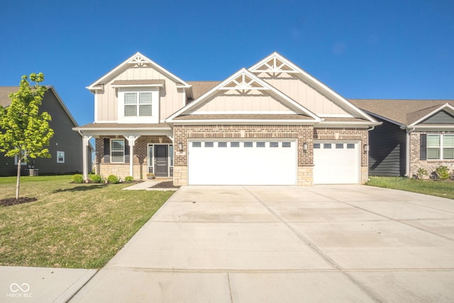 657 Kilmore Dr, Pendleton, IN 46064 - craftsman house featuring board and batten siding, driveway, a front yard, and an attached garage