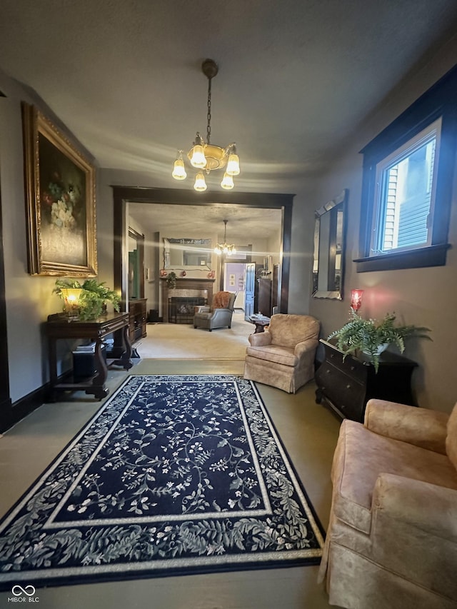 2119 S Garfield Dr, Indianapolis, IN 46203 - living room featuring a chandelier