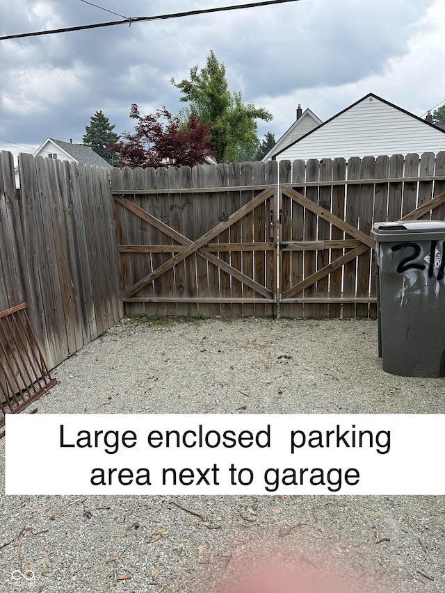 2119 S Garfield Dr, Indianapolis, IN 46203 - view of yard featuring a gate