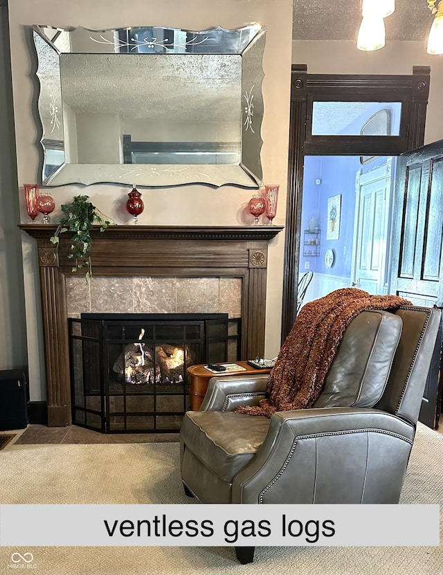2119 S Garfield Dr, Indianapolis, IN 46203 - carpeted living area featuring a tile fireplace