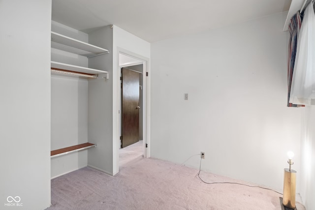 unfurnished bedroom with carpet