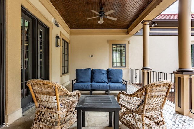 balcony featuring an outdoor hangout area and ceiling fan