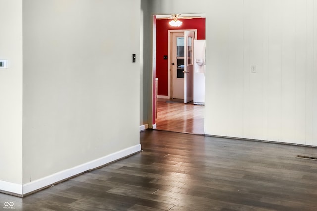 1020 E Sixth St, Greenfield, IN 46140 - empty room with dark wood-style floors and baseboards