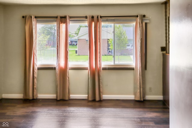 1020 E Sixth St, Greenfield, IN 46140 - doorway with baseboards and hardwood / wood-style flooring