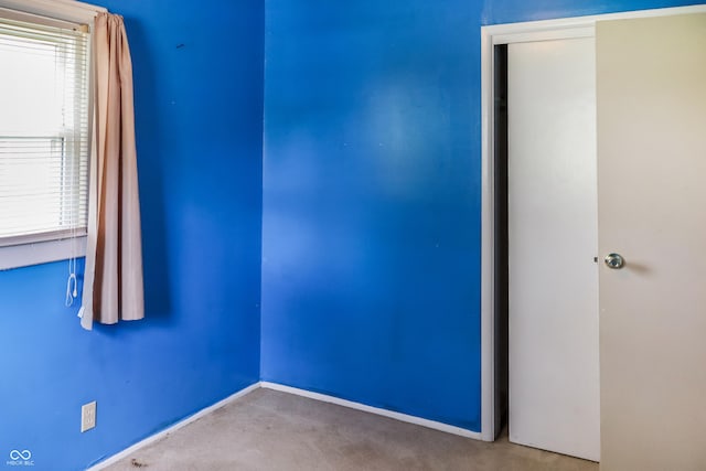 1020 E Sixth St, Greenfield, IN 46140 - unfurnished room with carpet floors, healthy amount of natural light, and baseboards