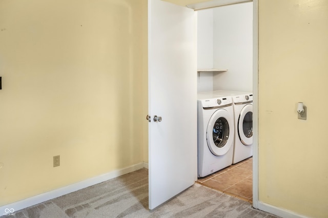1020 E Sixth St, Greenfield, IN 46140 - washroom with separate washer and dryer, light colored carpet, and baseboards