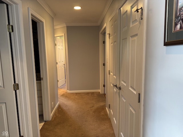 hall featuring ornamental molding, carpet floors, baseboards, and recessed lighting