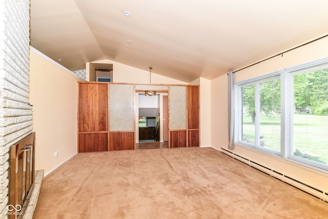 unfurnished living room featuring baseboard heating, lofted ceiling, carpet flooring, plenty of natural light, and baseboards