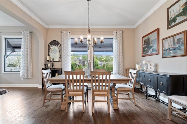 1013 Domino Dr, Carmel, IN 46032 - dining room with baseboards, a chandelier, ornamental molding, and dark wood-type flooring