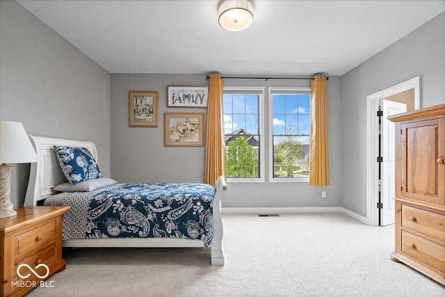 1013 Domino Dr, Carmel, IN 46032 - bedroom featuring carpet floors, baseboards, and visible vents