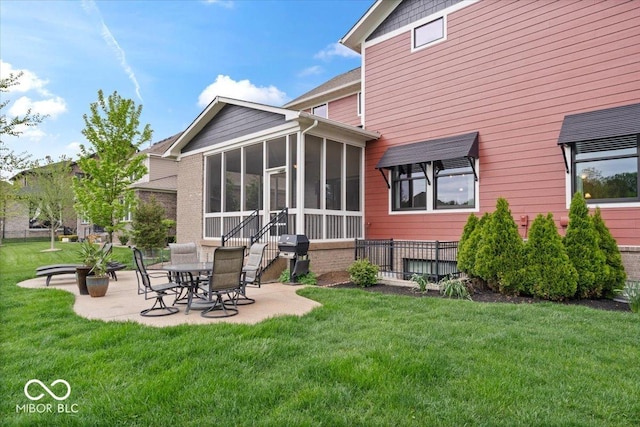 1013 Domino Dr, Carmel, IN 46032 - rear view of house featuring a sunroom, a yard, and a patio area