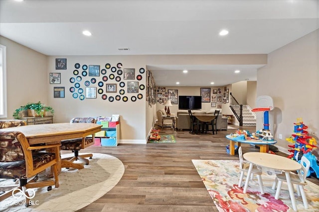1013 Domino Dr, Carmel, IN 46032 - playroom with baseboards, recessed lighting, wood finished floors, and visible vents