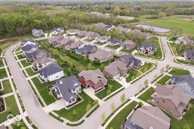 1013 Domino Dr, Carmel, IN 46032 - aerial view with a residential view, a water view, and a forest view