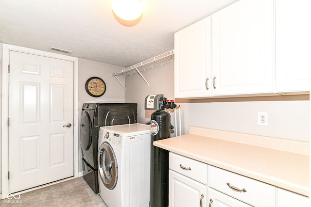 12092 Sugar Creek Rd, Noblesville, IN 46060 - laundry area featuring separate washer and dryer and cabinet space