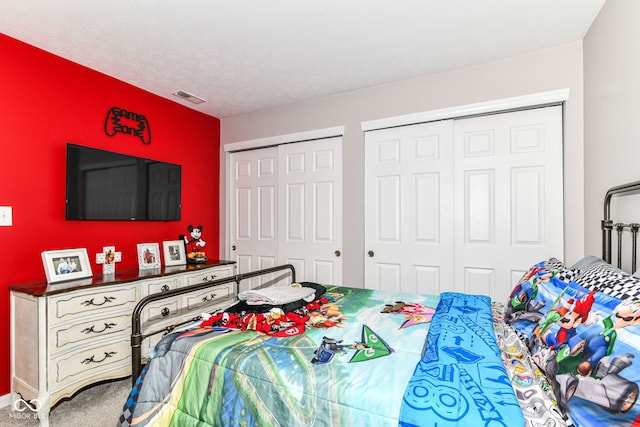 12092 Sugar Creek Rd, Noblesville, IN 46060 - carpeted bedroom featuring two closets