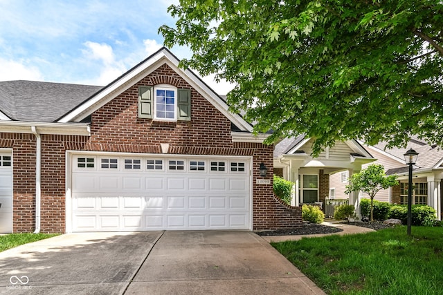 12092 Sugar Creek Rd, Noblesville, IN 46060 - view of front facade with brick siding, driveway, and an attached garage