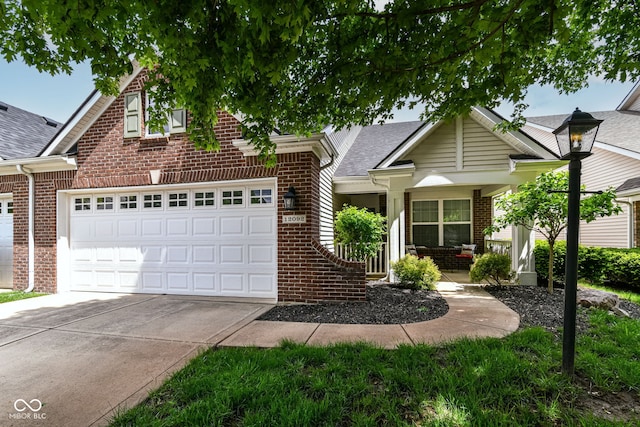 12092 Sugar Creek Rd, Noblesville, IN 46060 - view of front of property featuring brick siding, driveway, an attached garage, roof with shingles, and a porch