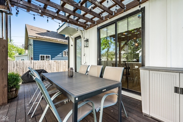 544 N Beville Ave, Indianapolis, IN 46201 - wooden deck featuring outdoor dining space, a pergola, and fence