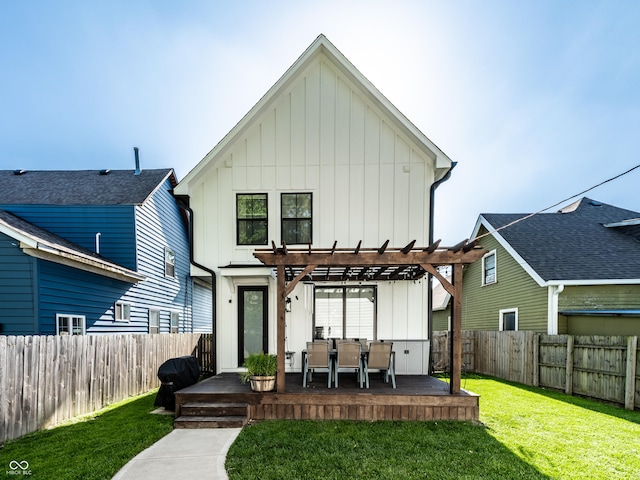 544 N Beville Ave, Indianapolis, IN 46201 - rear view of house featuring board and batten siding, a pergola, a wooden deck, and outdoor dining area
