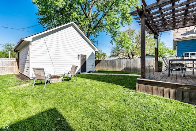 544 N Beville Ave, Indianapolis, IN 46201 - view of yard with a deck, a pergola, and an outdoor fire pit