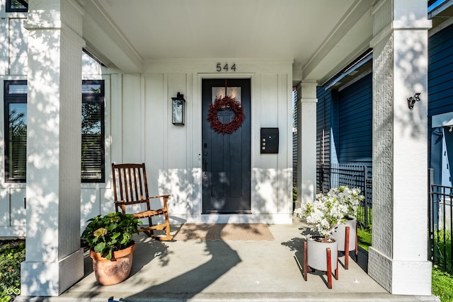 544 N Beville Ave, Indianapolis, IN 46201 - property entrance featuring board and batten siding and a porch