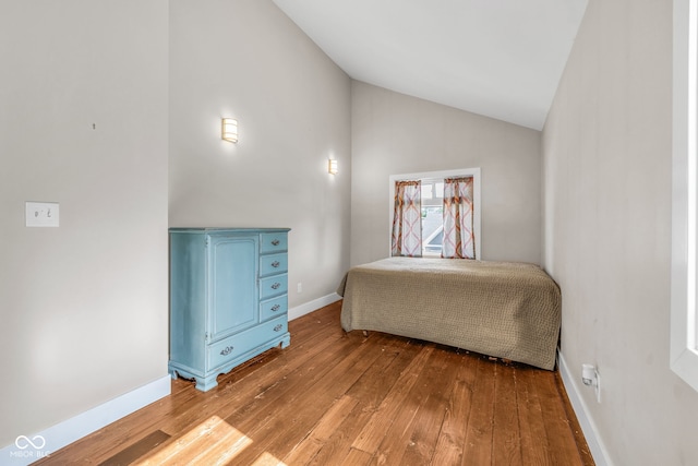 715 Terrace Ave, Indianapolis, IN 46203 - bedroom featuring hardwood / wood-style floors and vaulted ceiling