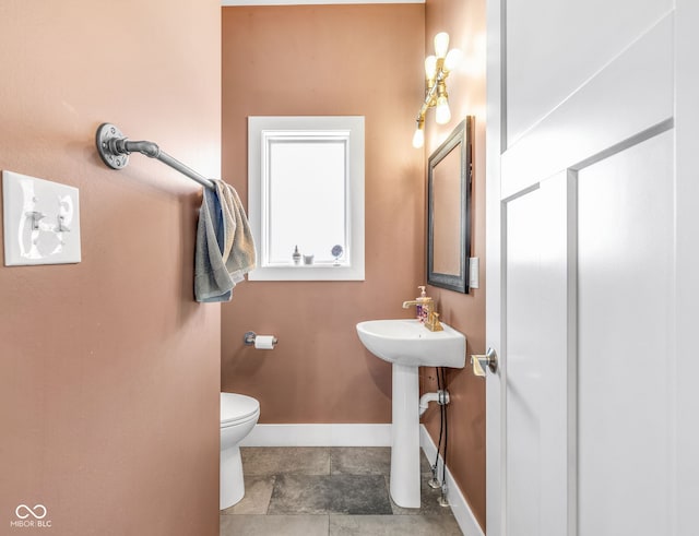 715 Terrace Ave, Indianapolis, IN 46203 - bathroom with toilet and baseboards