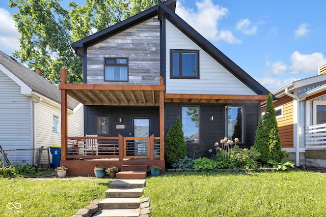 715 Terrace Ave, Indianapolis, IN 46203 - modern home featuring a porch