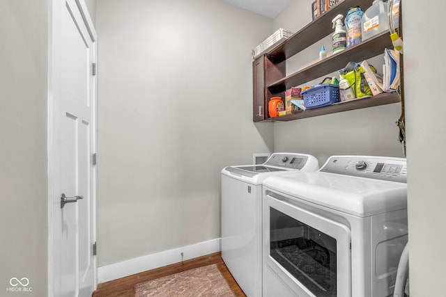 715 Terrace Ave, Indianapolis, IN 46203 - laundry area with washer and clothes dryer and wood finished floors
