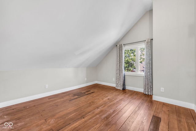 715 Terrace Ave, Indianapolis, IN 46203 - bonus room featuring lofted ceiling and hardwood / wood-style floors