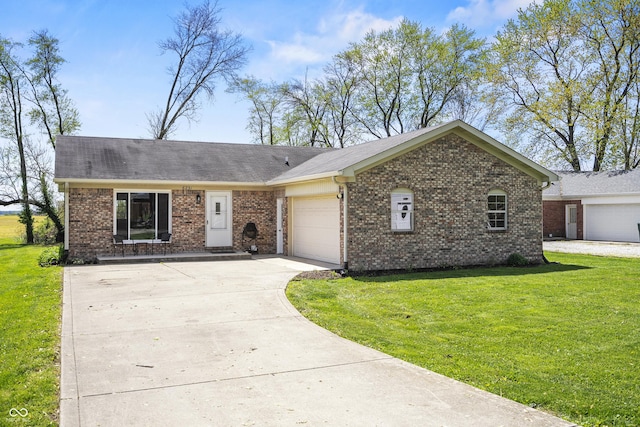 ranch-style home with an attached garage, a front lawn, brick siding, and concrete driveway
