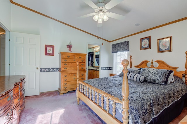 bedroom featuring ornamental molding, a ceiling fan, carpet flooring, and lofted ceiling