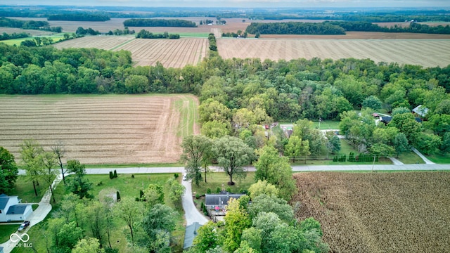 birds eye view of property featuring a rural view